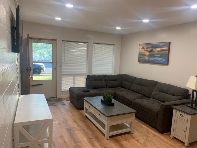 Living room /couch, television, console, coffee table, in table - 886 Raymond Dr