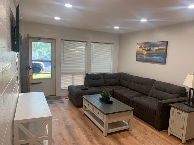 Living room /couch, television, console, coffee table, in table - 886 Raymond Dr