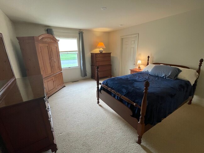 Bedroom with quality cherry bedroom set. - 21 Cambridge Ct
