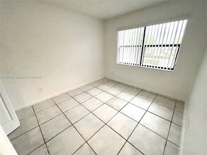 Building Photo - 10992 Royal Palm Blvd