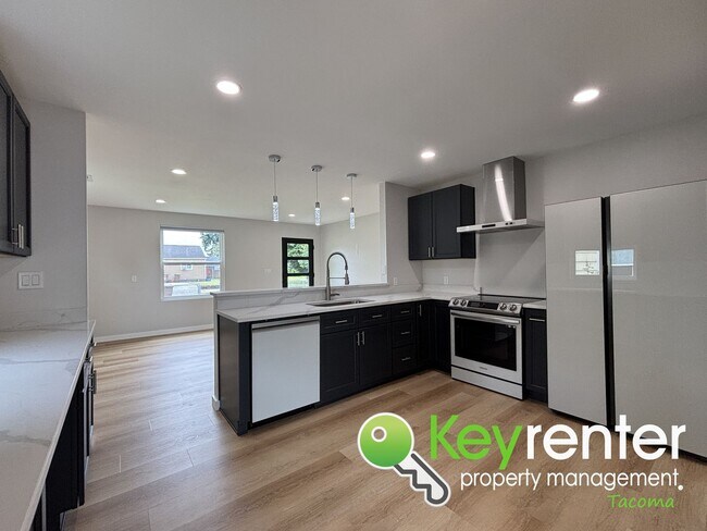 Building Photo - Freshly Remodeled Tacoma Gem with Smart Fe...