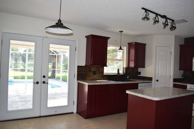 Building Photo - Pool Home 4/2.5 with water view. Great com...