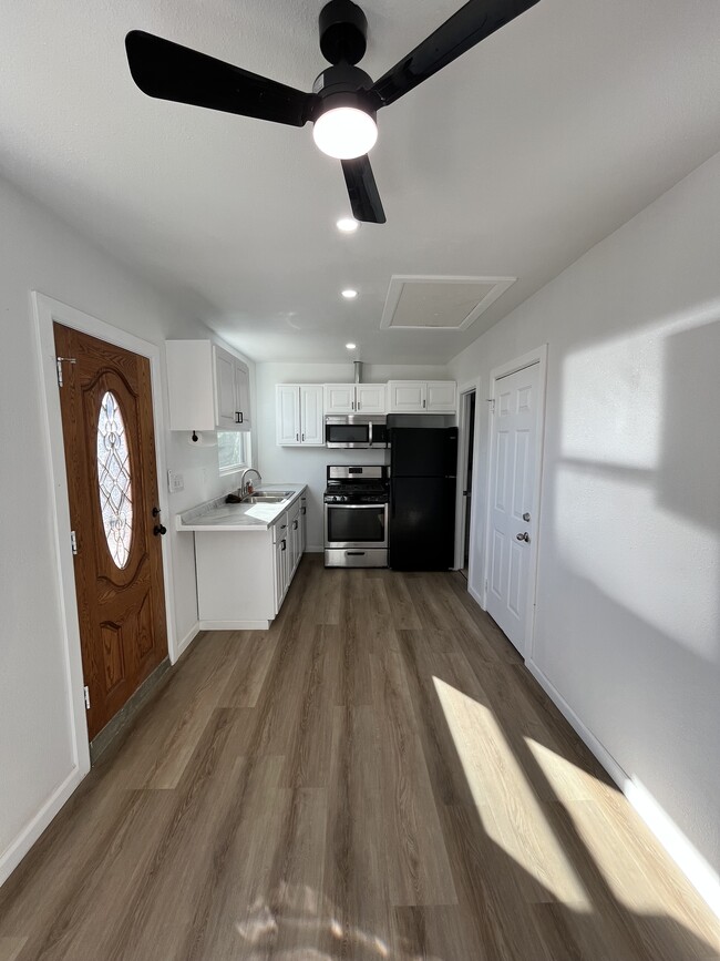Kitchen across living room - 14514 Keese Dr