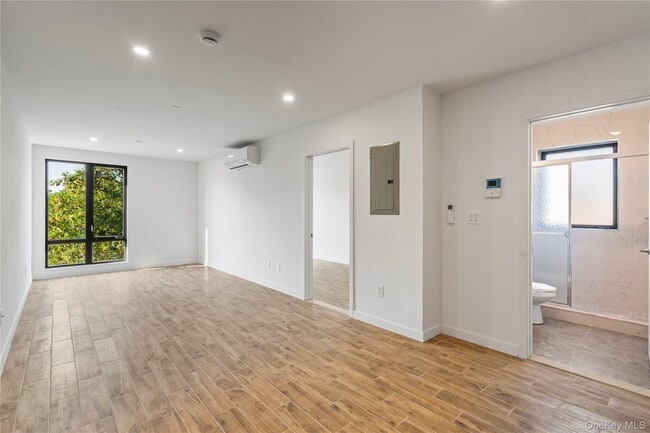 Building Photo - 213-41 38th Ave