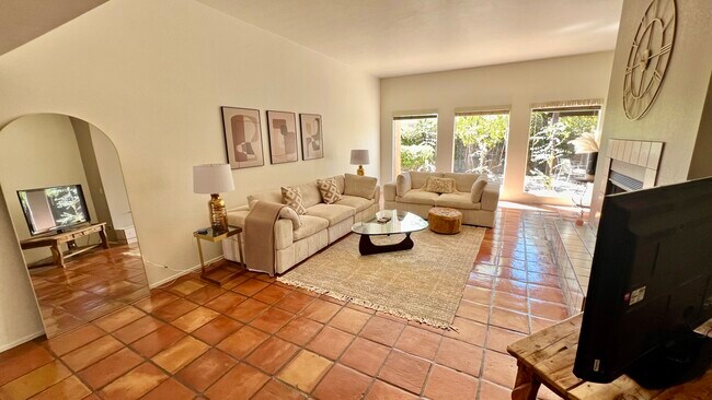 Large living with beautiful natural light and a smart TV - 5010 E South Regency Cir
