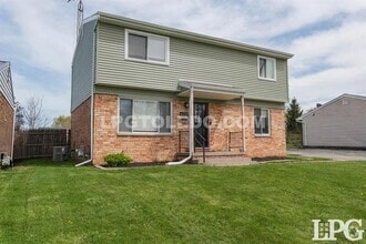 Building Photo - 4230 Dahlia Dr