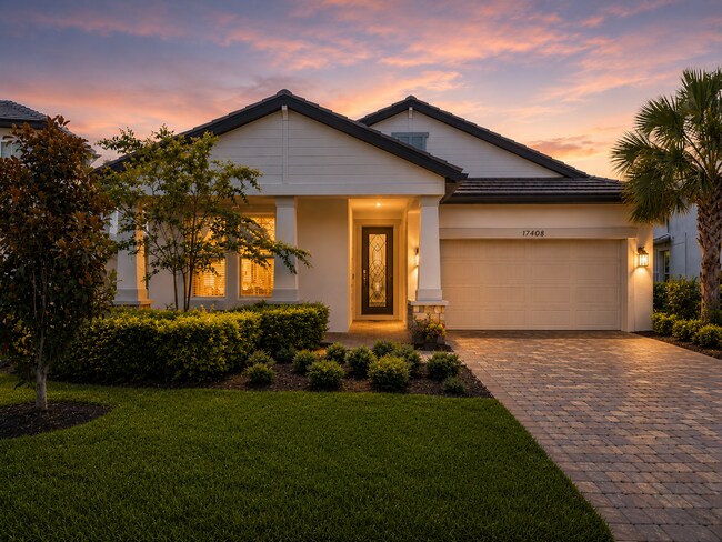 Building Photo - "Experience Tranquil Living: Stunning 3-Bed Lake View Home in Lakewood Ranch!"