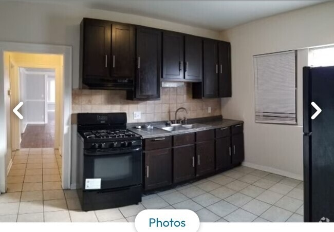 Building Photo - 8258 S Langley Ave