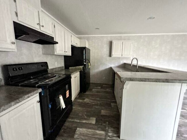 Foto del edificio - 4614 E Old Trail Rd