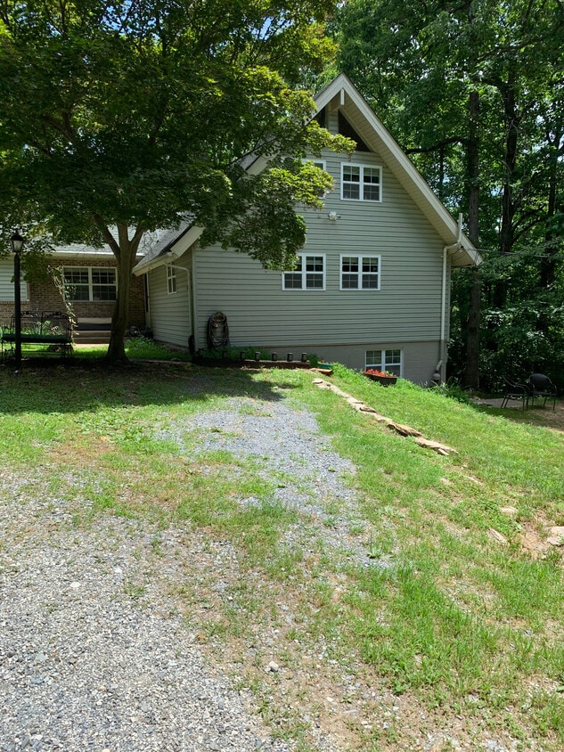 Pull into your new abode, walk down the steps to the right of the house. - 250 Barbara Ln