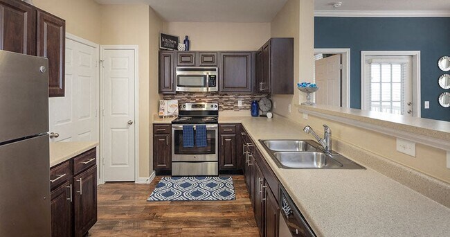 Foto del edificio - The Manor Homes of Arborwalk Apartments