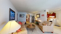 Located in Goose Creek, South Carolina, this well-appointed 2-bedroom, 2-bathroom single-floor home offers a thoughtfully organized layout designed for comfortable everyday living. The carpeted living room serves as the heart of the home, providing a warm and inviting gathering space with a window that allows natural light to fill the room. The galley-style kitchen features rich wood cabinetry lining both walls, light countertops, a double sink, and white appliances including a range and refrigerator, with tile flooring that adds a clean, practical finish. The spacious primary bedroom includes a ceiling fan with light fixture, plush carpet, and its own access to a full bathroom featuring a tub/shower combination. The second bedroom, also carpeted, offers a cozy retreat with a window for natural light. A second full bathroom with a tub/shower is conveniently accessible from the hallway. A dedicated in-unit laundry room provides added convenience with side-by-side washer and dryer hookups. The home also includes a hallway and closet for additional storage. The overall ambiance is warm and functional, making this Goose Creek residence a practical and comfortable place to call home.
