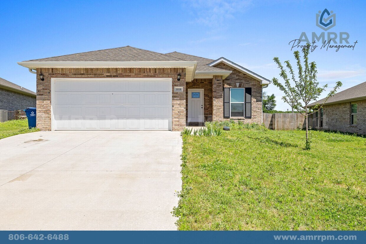 Foto principal - Spacious 3-Bedroom Home – Your Perfect Fam...