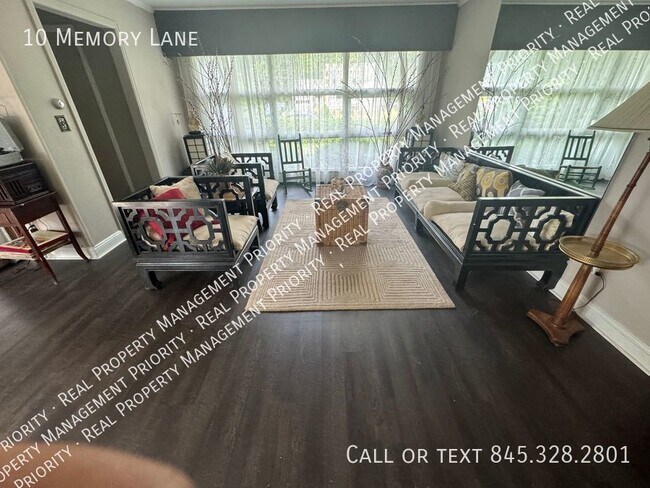 Foto del edificio - Fully Furnished 3 BR Home in Tranquil Comm...