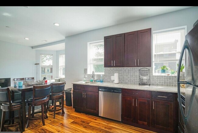 Building Photo - 4930 Florence Ave