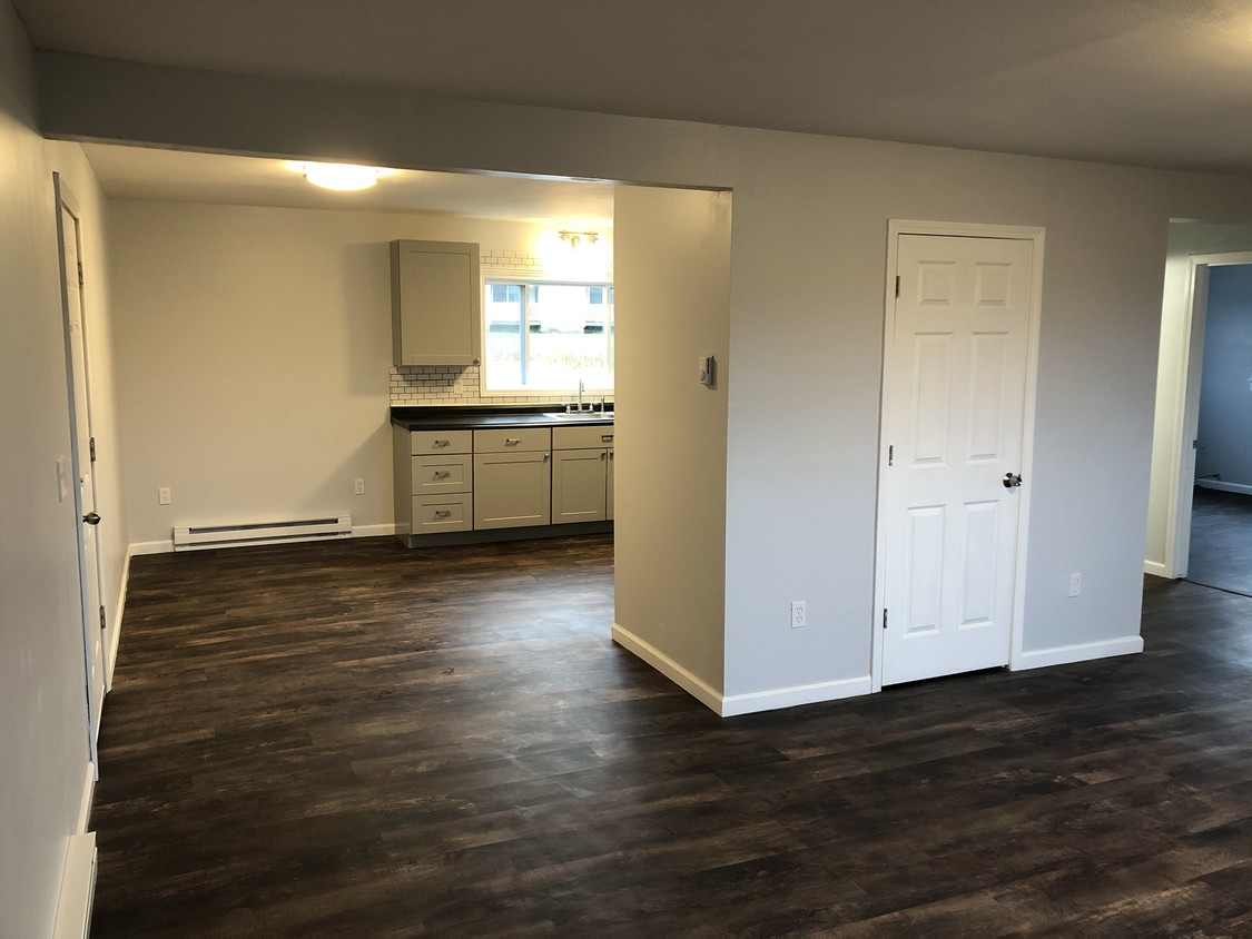 Living area and kitchen - 18 Green Acres Dr