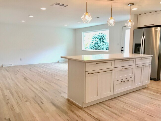 Large open kitchen that flows into Living area - 3360 ward road