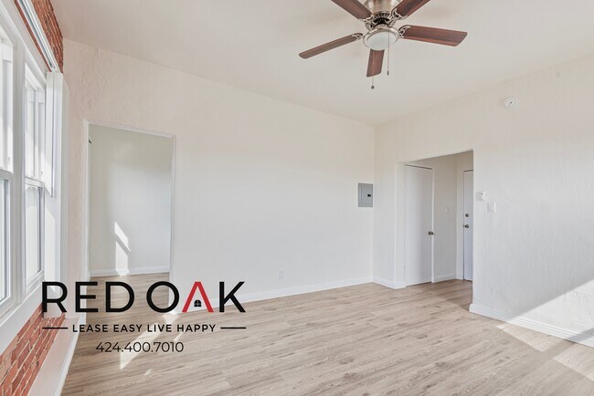 Building Photo - Studio with Exposed Brick Accent Wall, Lot...