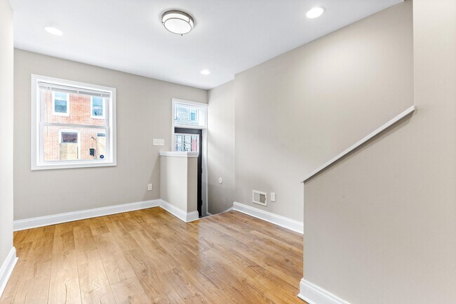Building Photo - Parkside Haven: Contemporary 2-Bedroom Row...