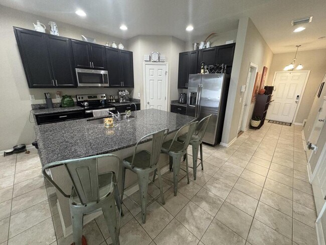 Foto del edificio - 7085 Woodchase Glen Dr