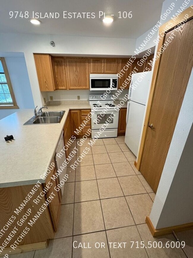 Foto del edificio - 9748 Island Estates Pl