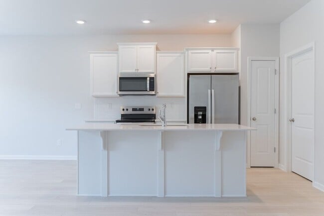 Building Photo - Newly constructed 3 Bedroom Townhome in Op...