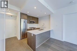 Building Photo - 9060 University Crescent