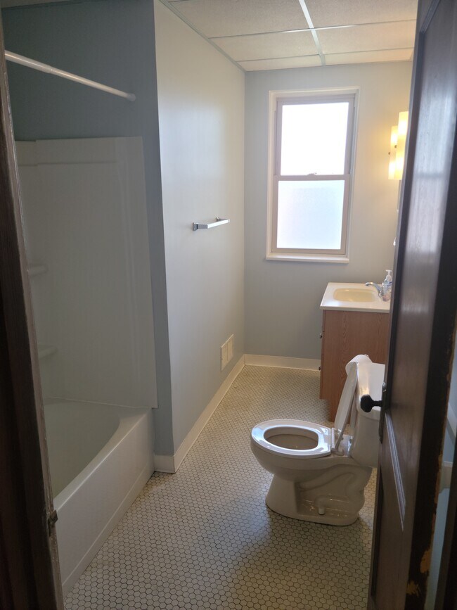 Large-bright bathroom with HUGE linen closet right outside of bath - 271 Center Ave
