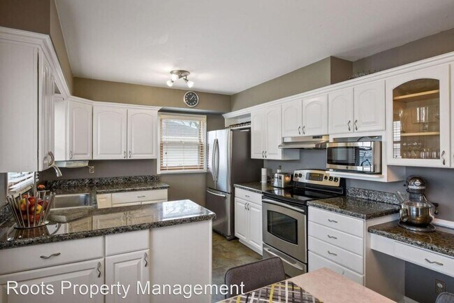 Building Photo - 4 br, 3 bath House - 7018 Girard Ave N