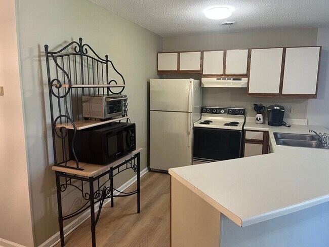 Building Photo - First month free with an eighteen-month le...