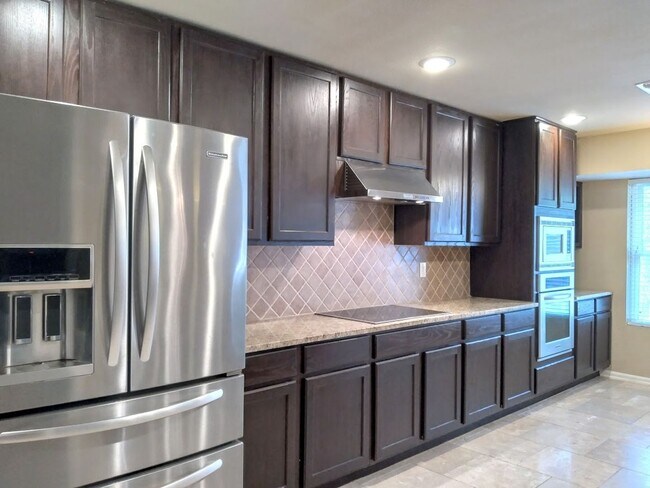 Building Photo - *COMING SOON* Exquisite Estate Living in Prestigious Hollywood Park With Outdoor Kitchen!