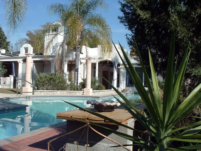 view from back of pool. - 19364 Powell Rd