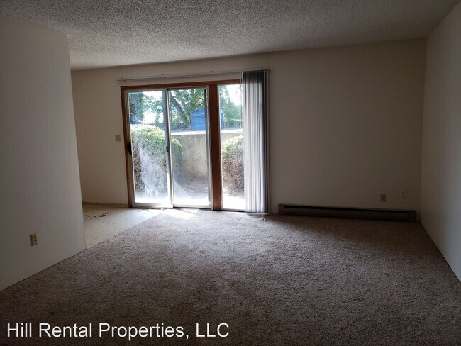 Building Photo - 2 br, 1 bath Apartment - 215 E Henley St.