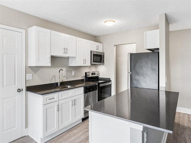 Building Photo - Greens on North Forest