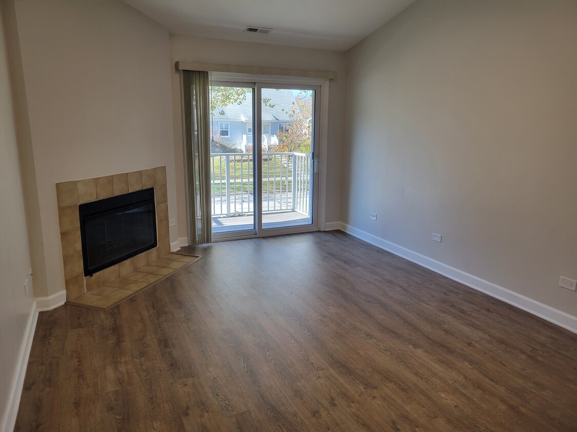 Living room with WBFP and Balcony - 45 Orchard Ter
