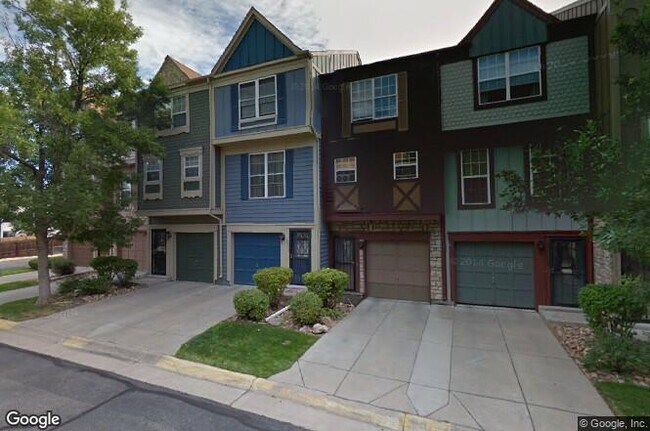 Blue townhouse with attached 1 car garage - 12042 E Ford Circle