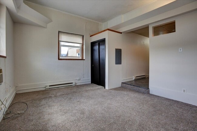 Building Photo - Cozy Studio Apartment - Menomonie, WI