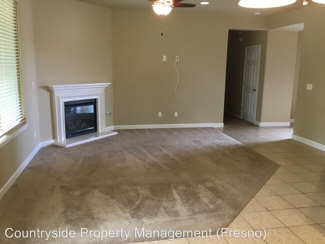 Building Photo - 3 br, 2 bath House - 5823 W. Ashcroft Avenue