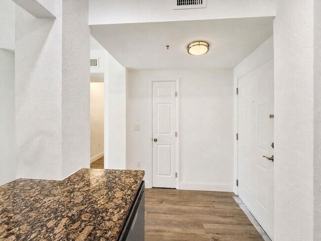 Building Photo - 3-bedroom + den, 2-bath condo at The Tides at Pelican Landing