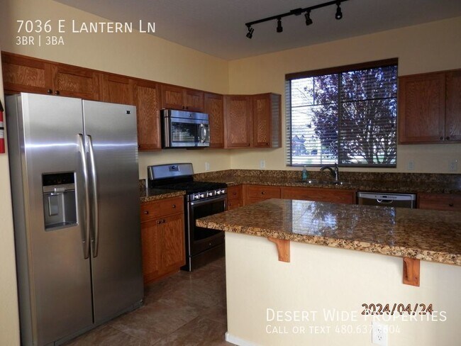 Building Photo - 7036 E Lantern Lane East