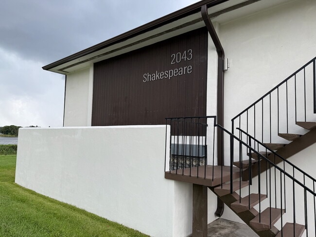 Side of Building with Logo - 2043 Shakespeare St