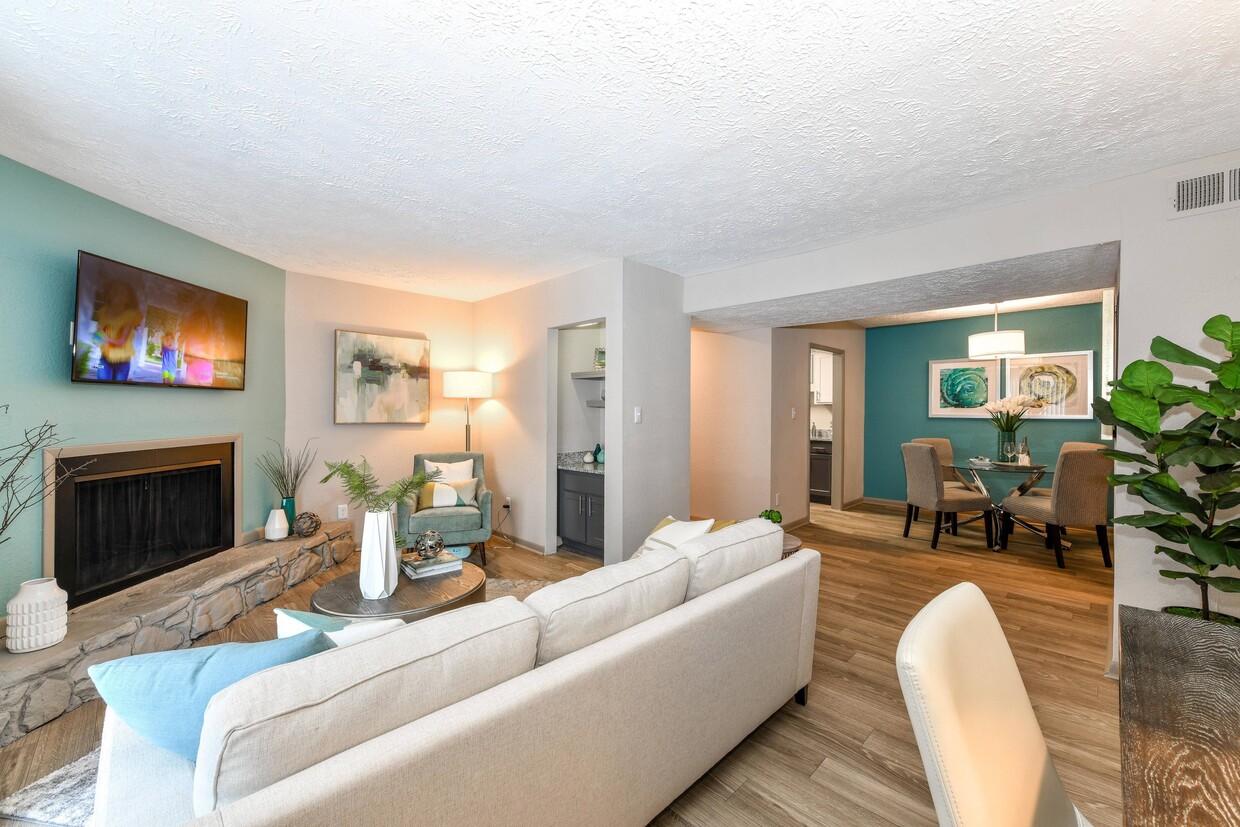 Living Room with Hardwood Style Flooring - Vue at Crestwood