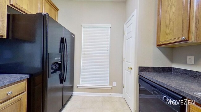 Foto del edificio - 5932 Hollow Wood Ct