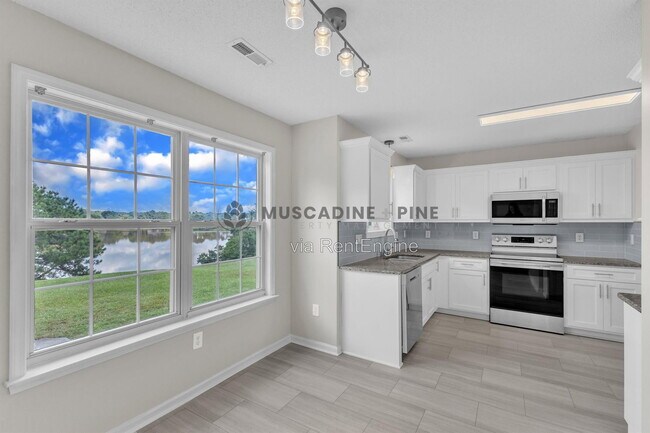 Foto del edificio - 503 Bellmeade Bay Dr
