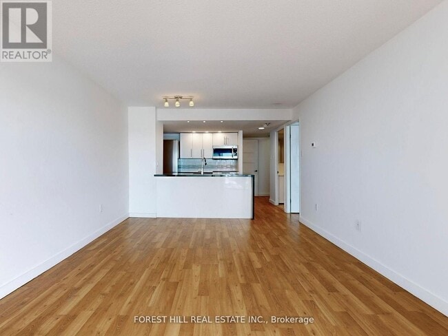 Photo du bâtiment - 725-725 King St W