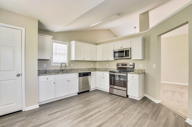 Foto del edificio - 6557 Snow Bird Ln