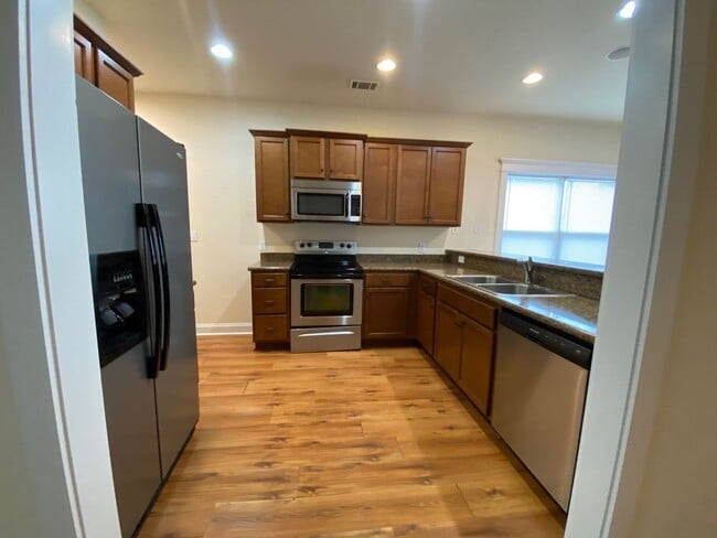Building Photo - PRE-LEASING FOR AUGUST 2026!