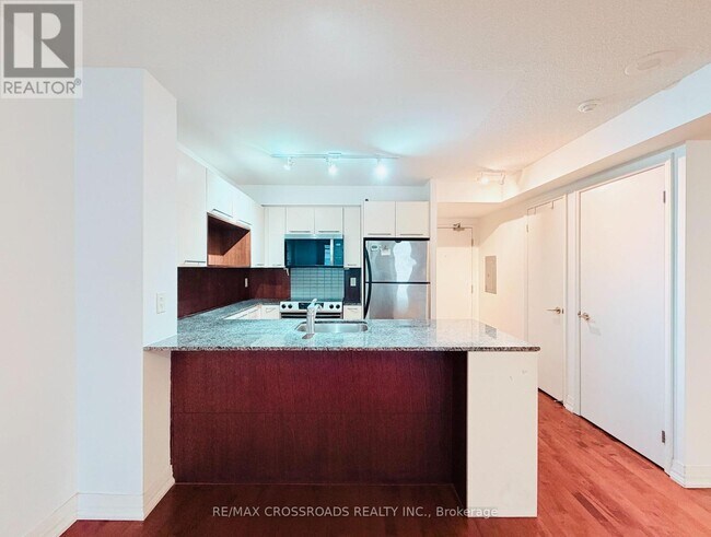 Photo du bâtiment - 21 Carlton St.