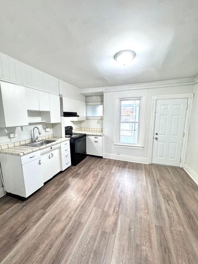 Building Photo - THREE Bedroom/ONE Bath Row Home