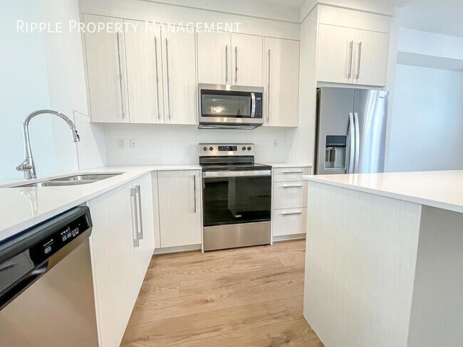 Photo du bâtiment - FANTASTIC 3 BEDS/ 2.5 BATHS TOWNHOUSE